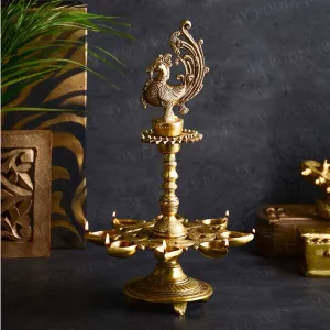 Alluring Brass Peacock Diya Stand